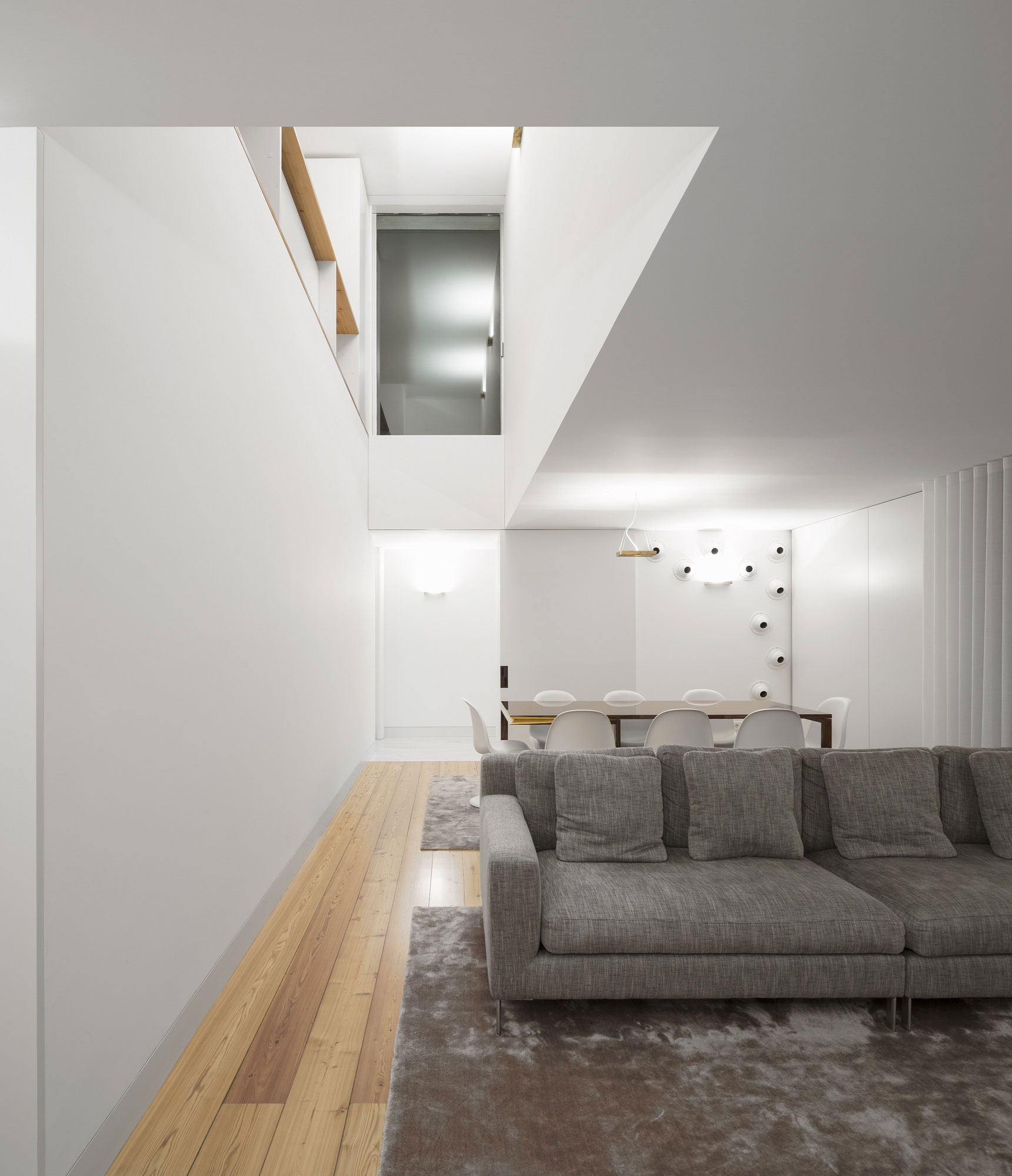 living-and-dining-room-large-modern-house-design-with-white-interior-color-decorating-ideas-plus-sofa-bed-wooden-table-and-chairs